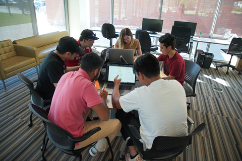 Students studying at table 