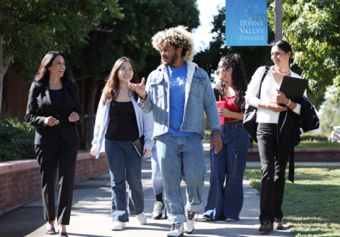 Students walking with Chancellor 