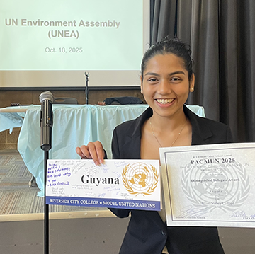 Chanali Henagama holding up certificate from Model UN event 