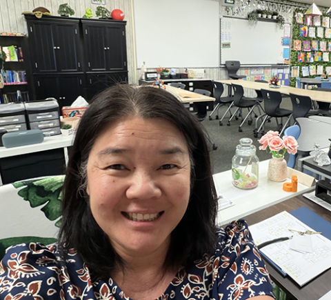 Quynh Curtis in a classroom 