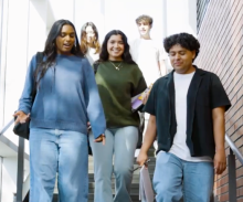 students walking down staircase 